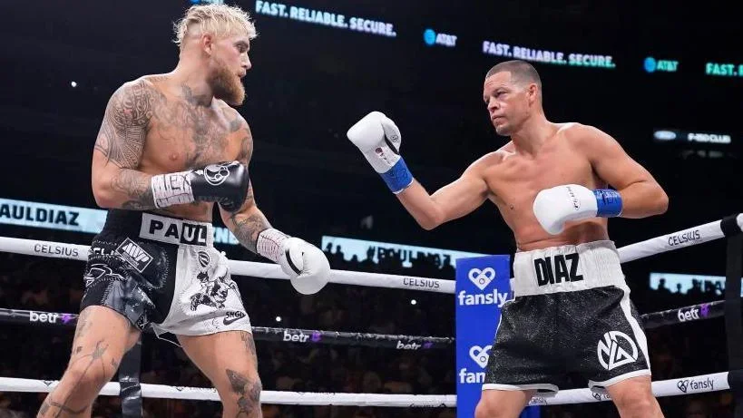 Jake Paul and Nate Diaz in the ring