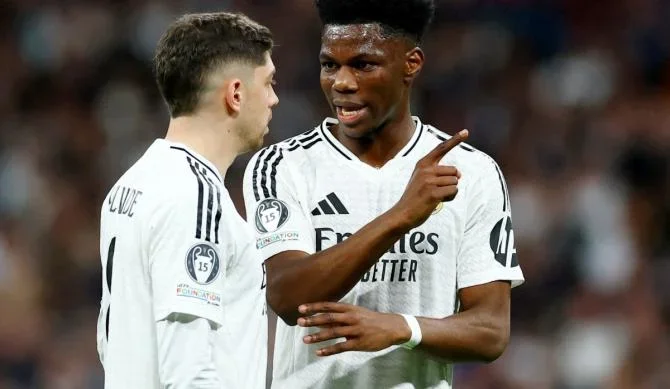 Real Madrid's Federico Valverde and Aurelien Tchouameni